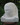 Stone abstract head sculpture tilted down to right as if in thought.